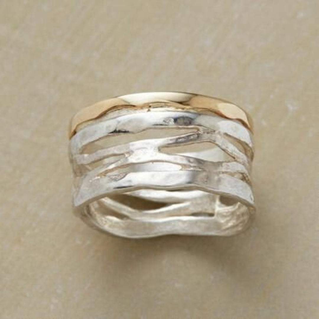 Bague creuse vintage en or et argent